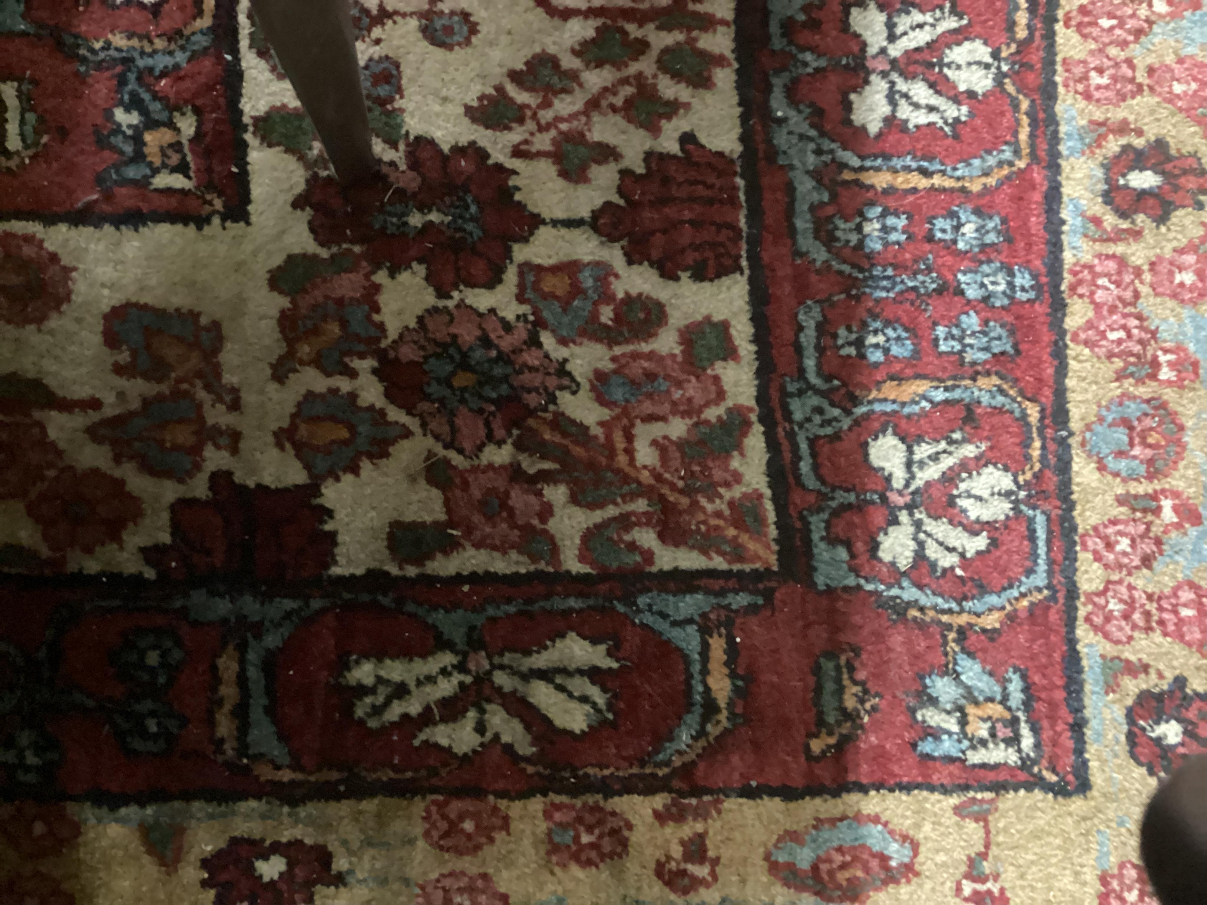 An Agra multi coloured carpet, the ground woven with interlocking oval medallions, 455 x 315cm